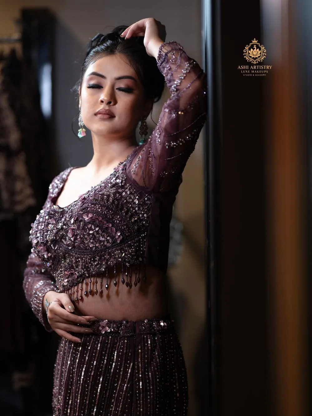 Editorial portrait in a purple sequinned gown