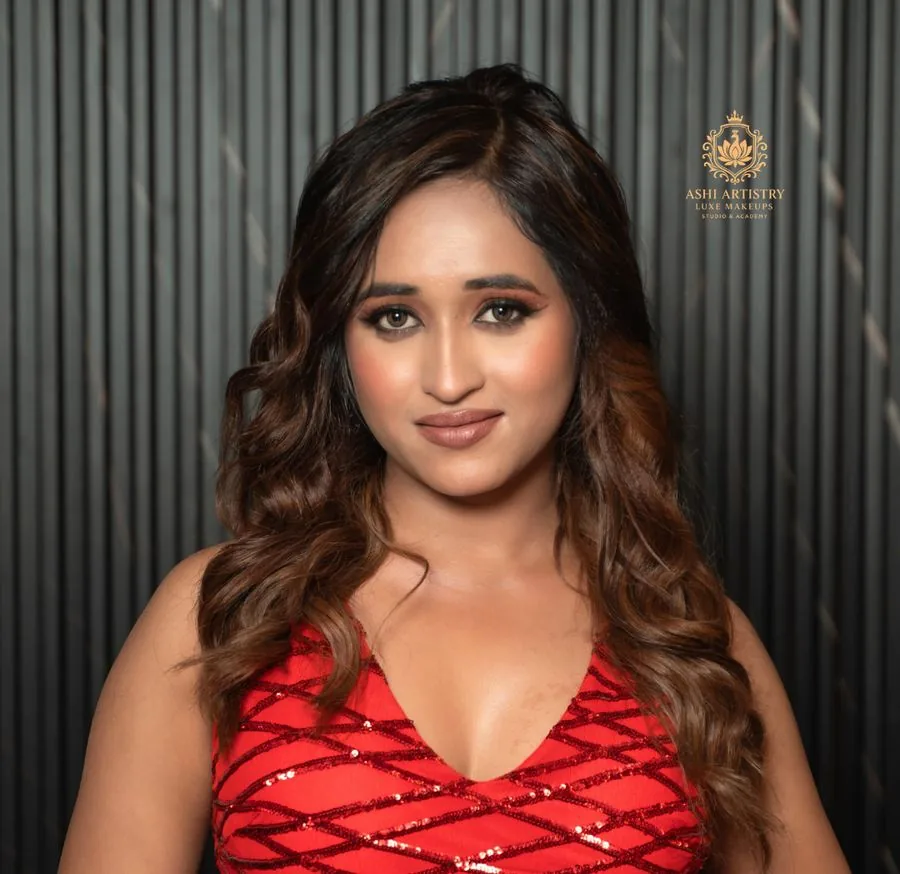 Party-ready glam look in a red sequinned gown