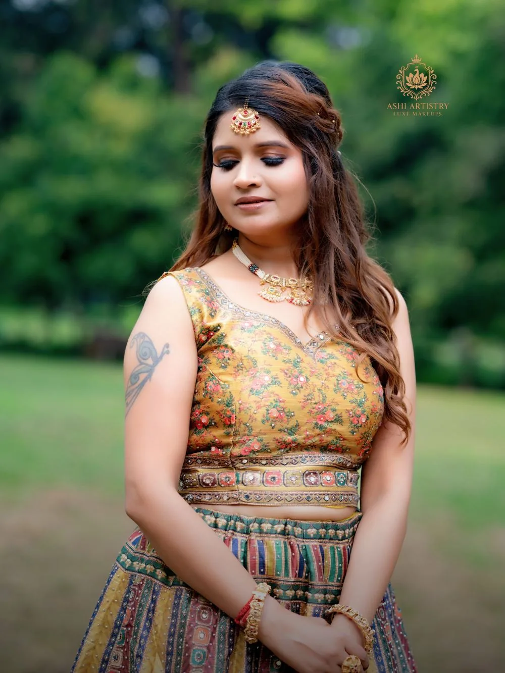 Haldi-ready glam look in a yellow-green lehenga outdoors